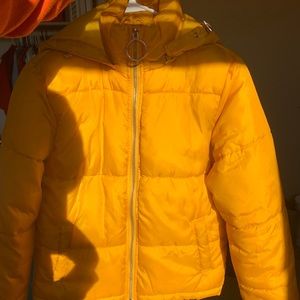 Yellow puffer jacket